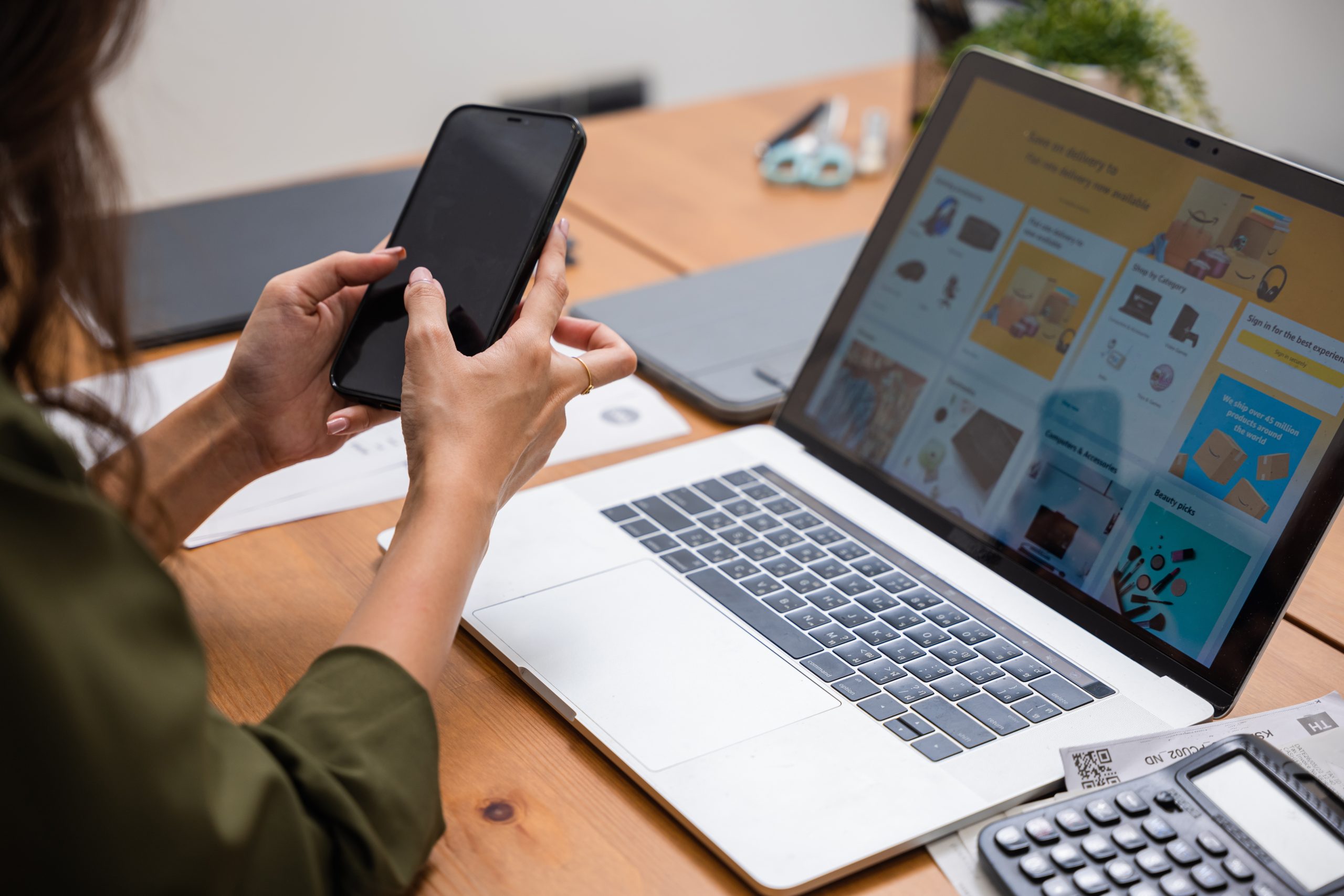 young woman pay for goods digital payment success on smartphone, Smile female buy product on laptop computer she pay money by mobile phone, Easy E-commerce shopping online, lifestyles technology